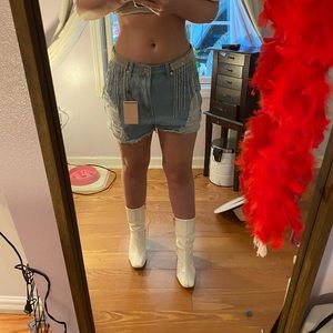 Jean shorts perfect for a concert or a night out. Never worn, still has tags
